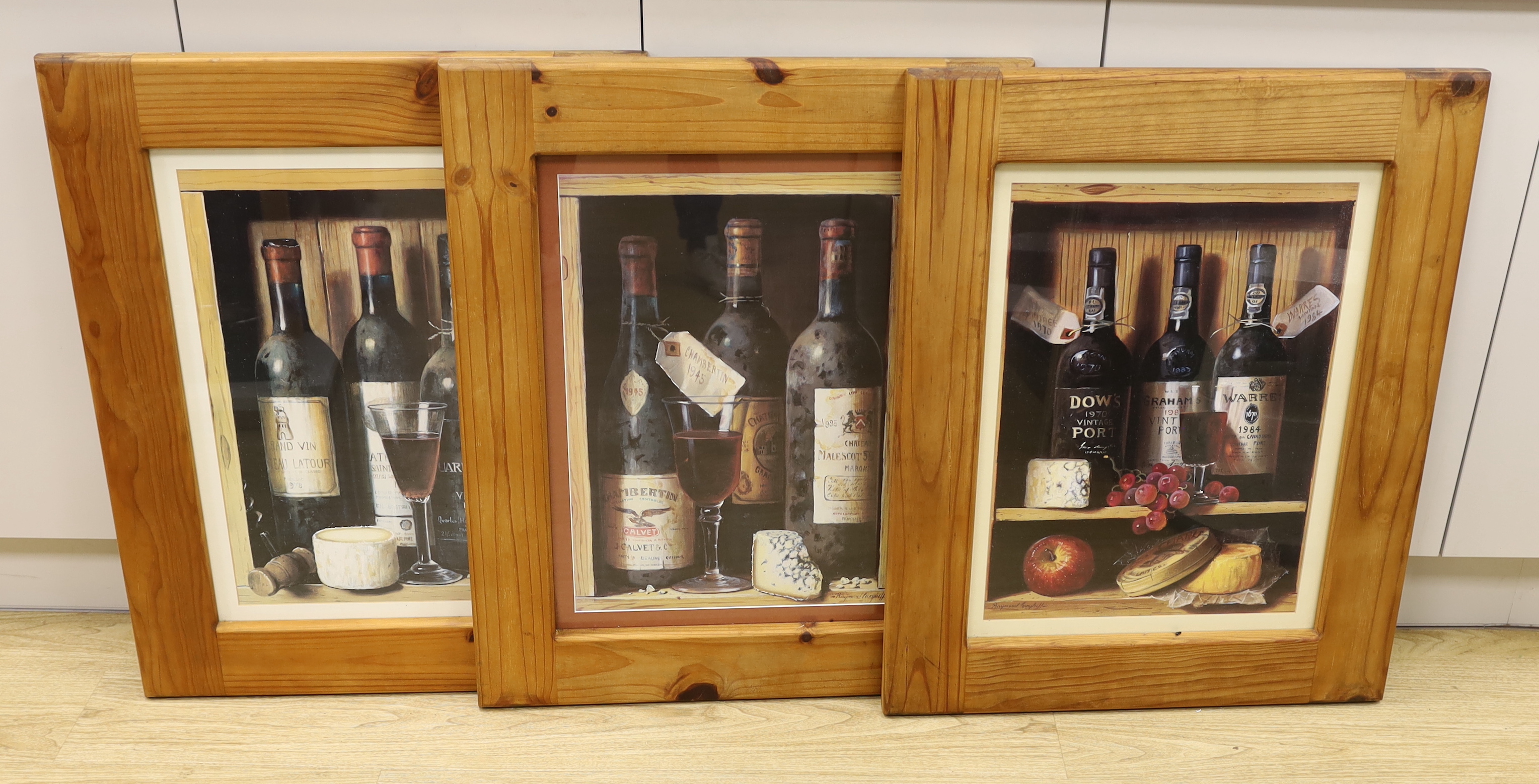 Raymond Campbell (b.1956), set of three colour prints, Still lifes of wine and port, housed in pine frames, 59 x 44cm